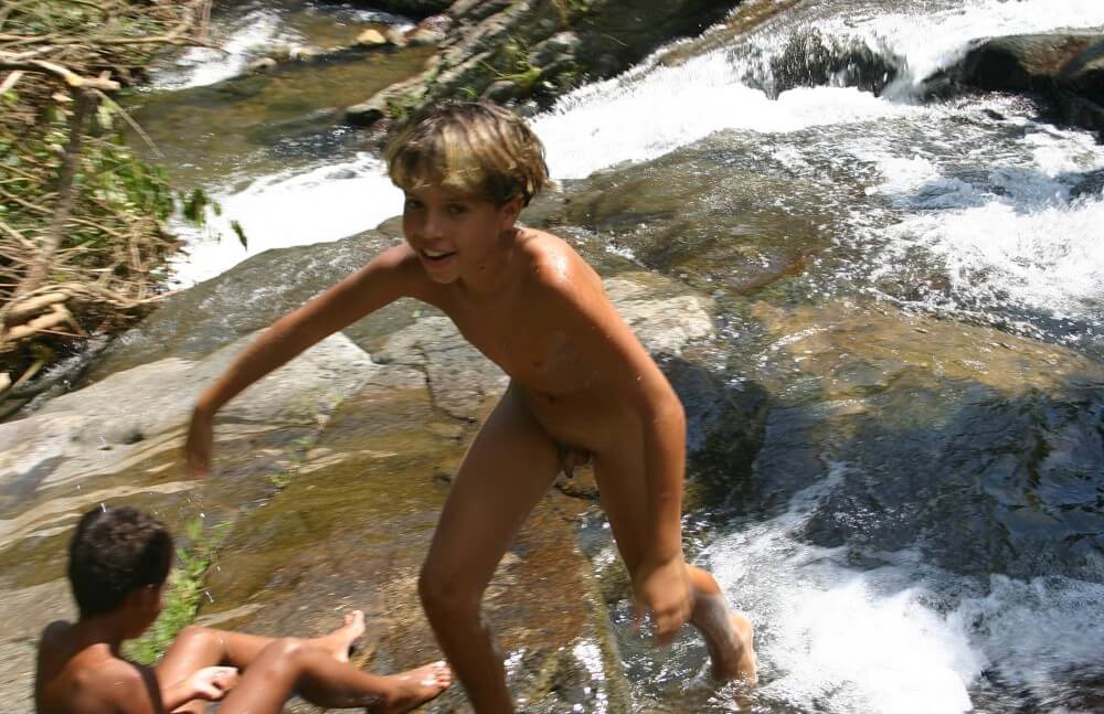 Brazilian Cliff Slide pics - Naturists love nature and the environment