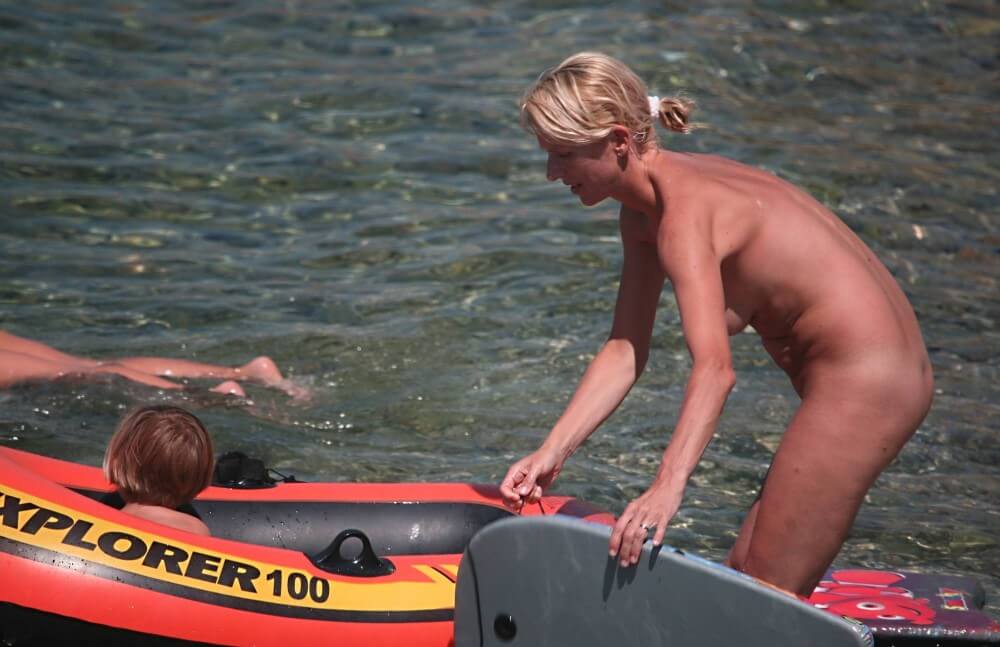 Red Boating for Two Nudists pics - People practice nudism to achieve harmony with nature