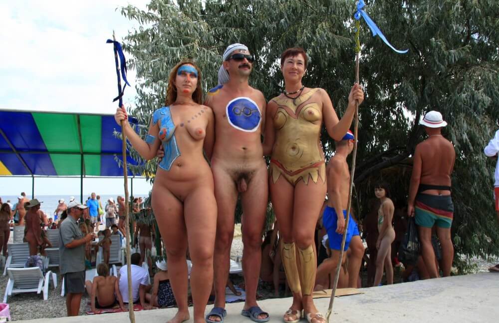 Three Painted Girl Poses pics - Nudity is seen as a natural and beautiful aspect of life