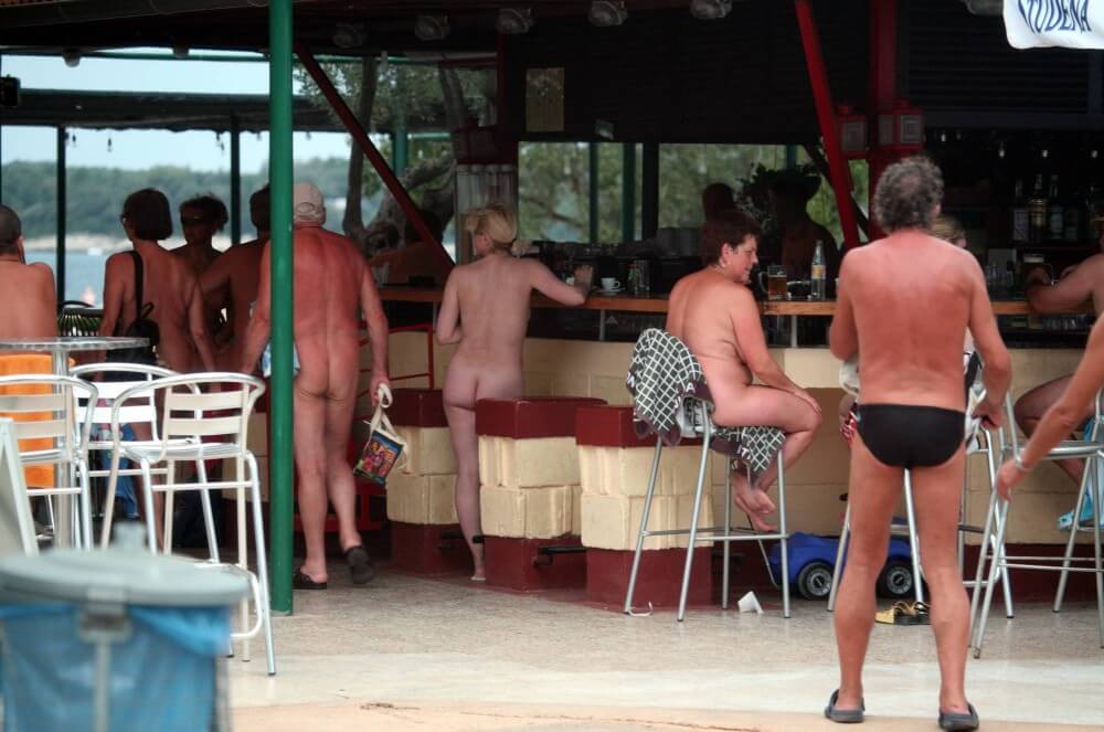 Outdoor diner view - Nudism and naturism as a philosophy of life based on respect and acceptance