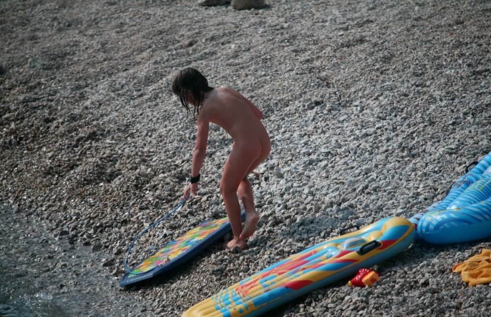 Naturist Surf Board Glides pics - People in a State of Complete Nudity