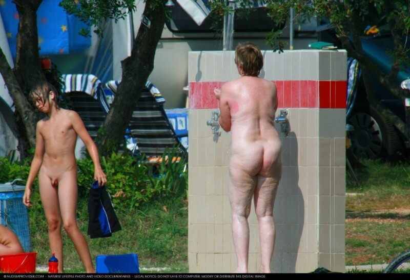 Covered in Towel Nudists-Boardwalk Biking - The nudist community strives for tolerance