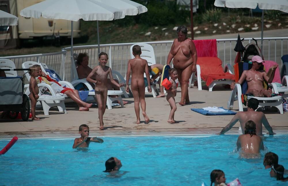 Naturist Afternoon Pool Games pics - The idea of being naked is good