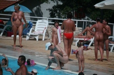 Enjoying The Sunny Pool gallery - Nature and nudism are the best home for a person