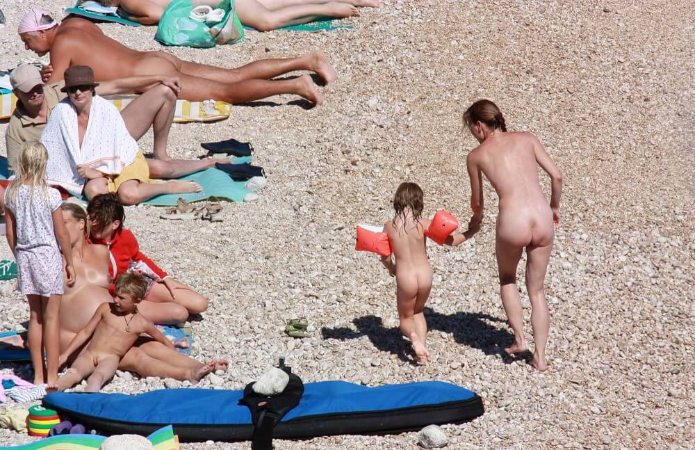 Orange Floaty Safety First Naturist pics - Nudism promotes psychological and physical well-being