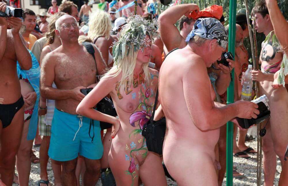 Neptune Painting Couple pics - Nudity in naturism is a way to experience freedom and harmony