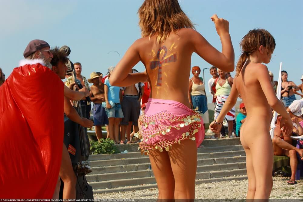 Colorful Carnival Dancing photos - Naturism as a way to connect with nature and achieve inner harmony
